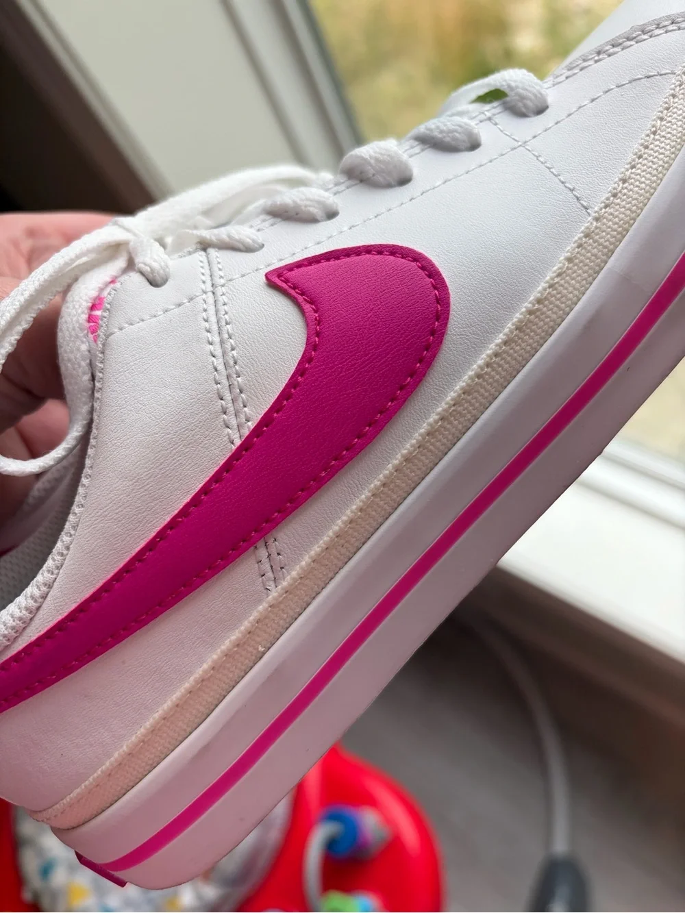 Nike White Sneakers with Pink Swoosh and Accent Stripe